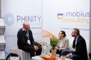 Delegates networking at the Mobius Consulting stand